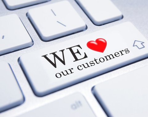 Une touche d'ordinateur "We love our customers"